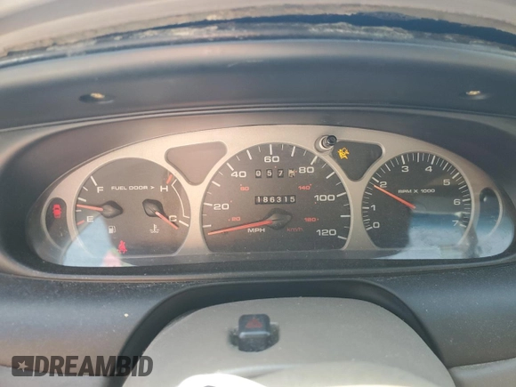 1999 Mercury Sable LS z VIN 1MEFM53S7XG602788, wystawiony jako Copart lot #76894294 z przebiegiem 186 315 mil mil oraz Szkoda całkowita • Salvage title. Historia ofert i sprzedaży dostępna na DreamBid. Obrazek 9.