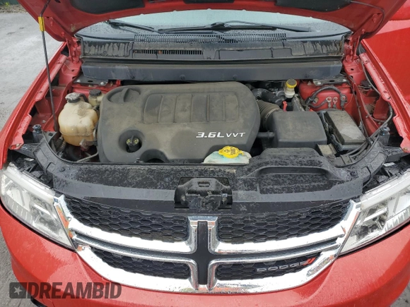 2014 Dodge Journey SXT z VIN 3C4PDDBG5ET290590, wystawiony jako Copart lot #57758595 z przebiegiem 87 443 mil mil oraz Szkoda całkowita • Salvage title. Historia ofert i sprzedaży dostępna na DreamBid. Obrazek 12.