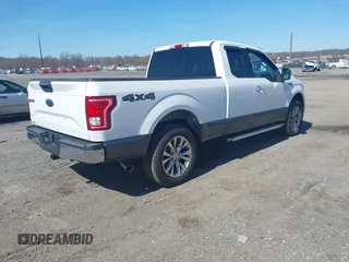 2015 Ford F-150 XLT with VIN 1FTEX1EP6FFA92864, listed as a IAAI auction lot 41738153 with 86,391 mi miles. Bid and sale history available at carsss.com. Image 4.