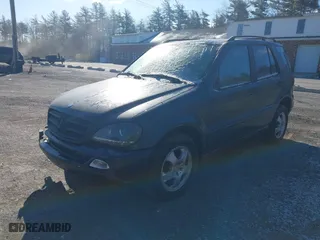 2003 Mercedes-Benz M-Class 3.7L with VIN 4JGAB57E23A450868, listed as a IAAI auction lot 41983681 with 125,468 mi miles. Bid and sale history available at carsss.com. Image 2.