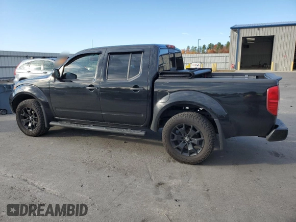 2020 Nissan Frontier Pro-4X with VIN 1N6ED0EB3LN710650, listed as a Copart auction lot 77419464 with 97,399 mi miles and Salvage title. Bid and sale history available at DreamBid. Image 2.