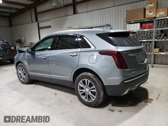 2023 Cadillac XT5 AWD Premium Luxury with VIN 1GYKNDRS5PZ221261, listed as a Copart auction lot 52779565 with 7,098 mi miles and Salvage Title. Bid and sale history available at DreamBid. Image 2.