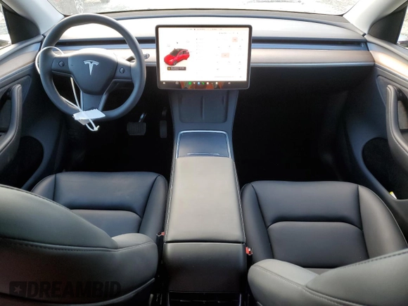 2024 Tesla Model Y Long Range with VIN 7SAYGDEE6RA318973, listed as a Copart auction lot 55586435 with 8,700 mi miles and Salvage title. Bid and sale history available at DreamBid. Image 8.