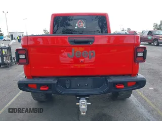 2021 Jeep Gladiator Rubicon with VIN 1C6JJTBGXML572976, listed as a IAAI auction lot 42134909 with 35,612 mi miles and . Bid and sale history available at DreamBid. Image 16.