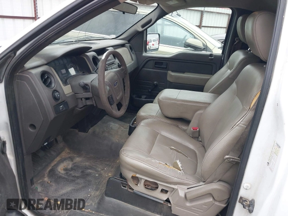 2009 Ford F-150 XL with VIN 1FTRF12839KA68521, listed as a IAAI auction lot 41307002 with 191,999 mi miles. Bid and sale history available at carsss.com. Image 14.
