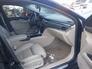2013 Cadillac XTS Premium z VIN 2G61S5S38D9199459, wystawiony jako IAAI lot #41787638 z przebiegiem 171 298 mil mil oraz . Historia ofert i sprzedaży dostępna na DreamBid. Obrazek 5.