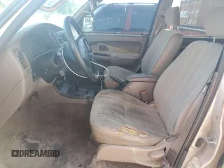 1998 Toyota 4Runner with VIN JT3GM84R3W0025871, listed as a Copart auction lot 57129535 with 219,664 mi miles and Clean title. Bid and sale history available at DreamBid. Image 7.