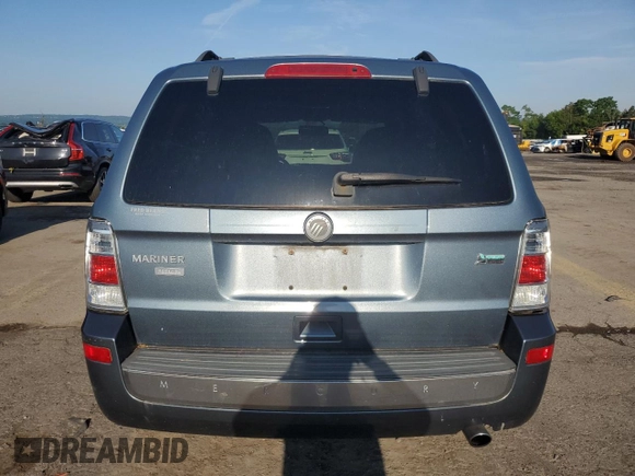 2010 Mercury Mariner Premier with VIN 4M2CN9HG7AKJ07163, listed as a Copart auction lot 62384925 with 113,591 mi miles and Salvage title. Bid and sale history available at DreamBid. Image 6.