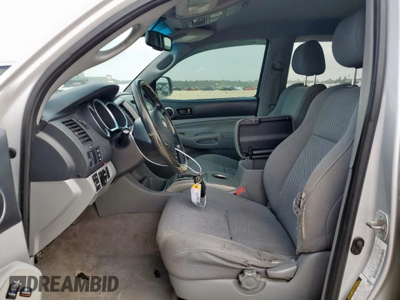 2007 Toyota Tacoma with VIN 5TEMU52N87Z388133, listed as a Copart auction lot 59040185 with 148,685 mi miles and Salvage title. Bid and sale history available at DreamBid. Image 7.