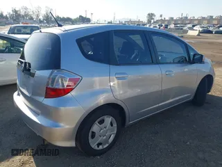 2013 Honda Fit with VIN JHMGE8H39DC055353, listed as a IAAI auction lot 41986501 with 159,569 mi miles. Bid and sale history available at carsss.com. Image 4.