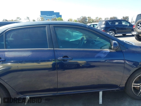 2012 Toyota Corolla L with VIN 2T1BU4EE3CC779137, listed as a IAAI auction lot 42008243 with 123,760 mi miles. Bid and sale history available at carsss.com. Image 14.