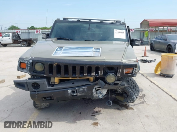 2006 Hummer H2 with VIN 5GRGN23U56H102574, listed as a IAAI auction lot 41955539 with 202,102 mi miles. Bid and sale history available at carsss.com. Image 13.