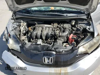 2016 Honda Fit LX with VIN JHMGK5H5XGX020620, listed as a Copart auction lot 60337295 with 103,827 mi miles and Salvage title. Bid and sale history available at DreamBid. Image 12.