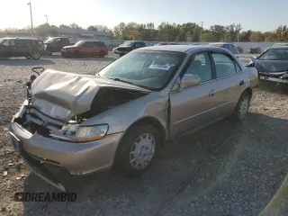 2002 Honda Accord LX with VIN 1HGCG56412A059833, listed as a Copart auction lot 55038105 with 245,110 mi miles and Non repairable. Bid and sale history available at DreamBid. Image 1.