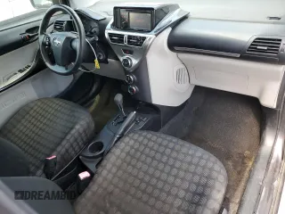 2012 Scion iQ with VIN JTNJJXB06CJ011117, listed as a Copart auction lot 52694345 with 94,547 mi miles and Salvage Title. Bid and sale history available at carsss.com. Image 8.