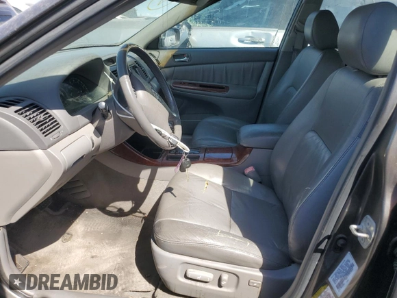 2004 Toyota Camry LE with VIN 4T1BF30K24U569209, listed as a Copart auction lot 66181644 with 186,412 mi miles and Salvage Title. Bid and sale history available at carsss.com. Image 7.