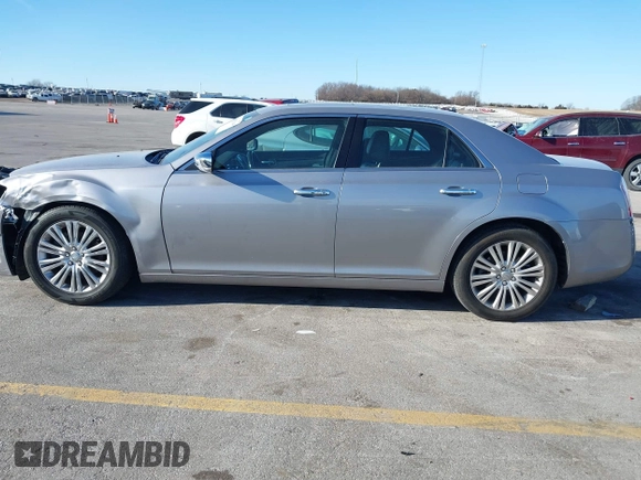 2014 Chrysler 300 C with VIN 2C3CCAKG3EH212936, listed as a IAAI auction lot 40921649 with 153,000 mi miles and . Bid and sale history available at carsss.com. Image 14.