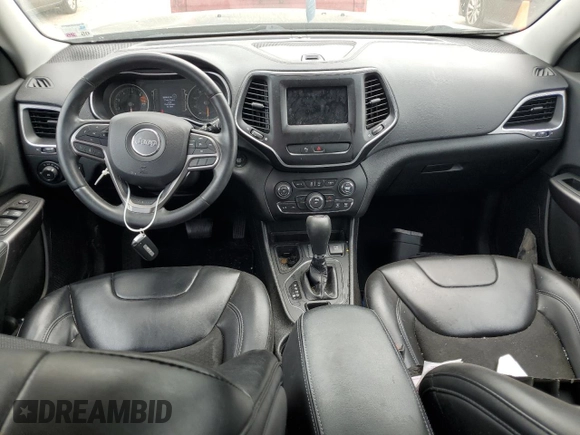 2019 Jeep Cherokee Latitude Plus with VIN 1C4PJLLB4KD344520, listed as a Copart auction lot 54535535 with 121,277 mi miles and Salvage Title. Bid and sale history available at DreamBid. Image 8.
