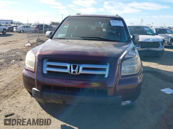 2007 Honda Pilot EX-L with VIN 2HKYF18677H524713, listed as a IAAI auction lot 41345312 with 169,957 mi miles and . Bid and sale history available at DreamBid. Image 6.
