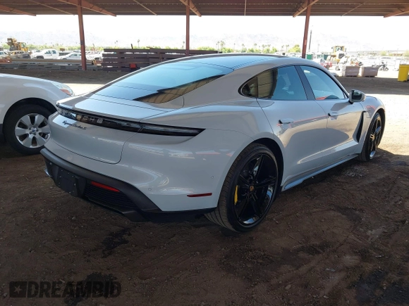 2021 Porsche Taycan Turbo z VIN WP0AC2Y1XMSA63835, wystawiony jako IAAI lot #42579977 z przebiegiem 5 841 mil mil oraz . Historia ofert i sprzedaży dostępna na DreamBid. Obrazek 4.