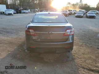 2015 Ford Taurus SE with VIN 1FAHP2D86FG184747, listed as a Copart auction lot 77659254 with 140,404 mi miles and Clean Title. Bid and sale history available at carsss.com. Image 6.