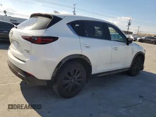 2022 Mazda CX-5 2.5 Turbo with VIN JM3KFBAY5N0525299, listed as a Copart auction lot 44736945 with 53,890 mi miles and Salvage Title. Bid and sale history available at carsss.com. Image 3.
