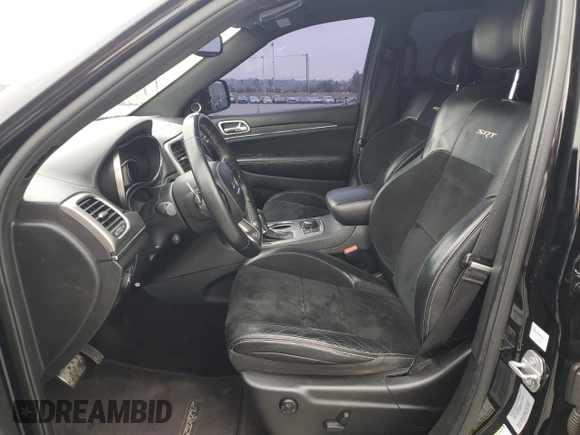 2017 Jeep Grand Cherokee SRT with VIN 1C4RJFDJ1HC904654, listed as a Copart auction lot 55954124 with 82,507 mi miles and Salvage Title. Bid and sale history available at carsss.com. Image 7.