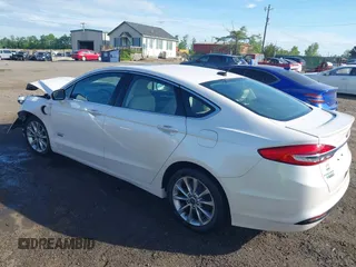 2017 Ford Fusion Titanium with VIN 3FA6P0SU6HR409854, listed as a IAAI auction lot 42143031 with 52,688 mi miles and . Bid and sale history available at DreamBid. Image 3.