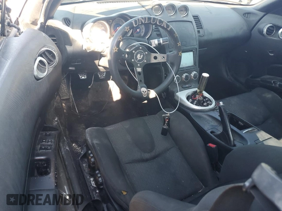 2005 Nissan 350Z with VIN JN1AZ34D05M608841, listed as a Copart auction lot 70408954 with 226,812 mi miles and Salvage Title. Bid and sale history available at DreamBid. Image 8.