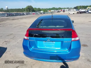 2010 Honda Insight EX with VIN JHMZE2H74AS013148, listed as a IAAI auction lot 42194894 with 114,885 mi miles and . Bid and sale history available at DreamBid. Image 15.