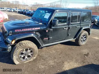 2018 Jeep Wrangler Unlimited Rubicon with VIN 1C4HJXFG6JW242027, listed as a IAAI auction lot 41822122 with 71,527 mi miles. Bid and sale history available at carsss.com. Image 19.