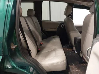2004 Jeep Liberty Limited z VIN 1J4GL58K74W158762, wystawiony jako IAAI lot #42228405 z przebiegiem 133 943 mil mil oraz . Historia ofert i sprzedaży dostępna na DreamBid. Obrazek 8.