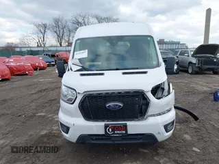2021 Ford Transit Passenger XL with VIN 1FBAX2C82MKA32735, listed as a IAAI auction lot 41312892 with 62,053 mi miles and . Bid and sale history available at DreamBid. Image 19.