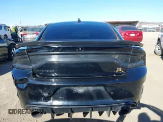 2020 Dodge Charger Scat Pack z VIN 2C3CDXGJ5LH162266, wystawiony jako IAAI lot #41763759 z przebiegiem 83 366 mil mil oraz . Historia ofert i sprzedaży dostępna na DreamBid. Obrazek 16.