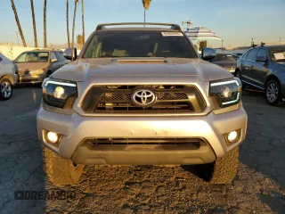 2014 Toyota Tacoma PreRunner with VIN 3TMKU4HNXEM041311, listed as a Copart auction lot 84065684 with 212,473 mi miles and Salvage title. Bid and sale history available at DreamBid. Image 5.