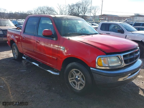 2002 Ford F-150 XLT with VIN 1FTRW07612KD75533, listed as a IAAI auction lot 41602986 with 1 mi miles. Bid and sale history available at carsss.com. Image 1.