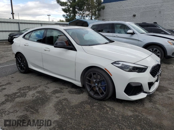 2020 BMW 2 Series M235i xDrive with VIN WBA13AL07L7G06064, listed as a Copart auction lot 42617345 with 67,338 mi miles and Salvage Title. Bid and sale history available at carsss.com. Image 4.