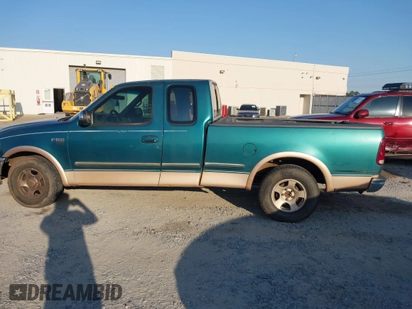 1997 Ford F-150 with VIN 1FTDX1768VNA17006, listed as a IAAI auction lot 42049325 with 206,839 mi miles and . Bid and sale history available at DreamBid. Image 14.