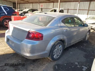 2013 Dodge Avenger SE with VIN 1C3CDZAB4DN590562, listed as a IAAI auction lot 41689241 with 258,167 mi miles and . Bid and sale history available at carsss.com. Image 4.
