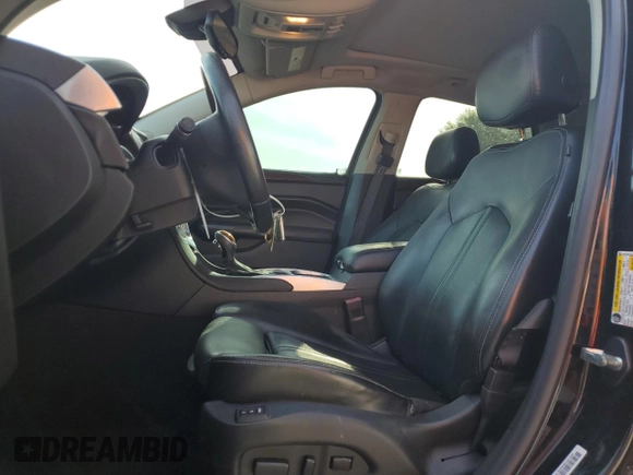 2015 Cadillac SRX Performance Collection with VIN 3GYFNCE32FS558430, listed as a Copart auction lot 63633865 with 153,729 mi miles and Salvage title. Bid and sale history available at DreamBid. Image 7.