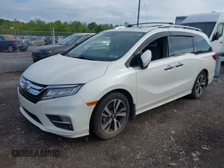 2018 Honda Odyssey Elite with VIN 5FNRL6H98JB045078, listed as a IAAI auction lot 42184758 with 144,981 mi miles. Bid and sale history available at carsss.com. Image 2.