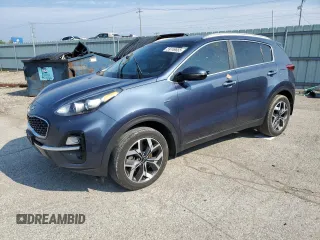 2021 Kia Sportage EX z VIN KNDPNCACXM7873312, wystawiony jako Copart lot #59749665 z przebiegiem 131 347 mil mil oraz Czysty tytuł • Clean title. Historia ofert i sprzedaży dostępna na DreamBid. Obrazek 1.
