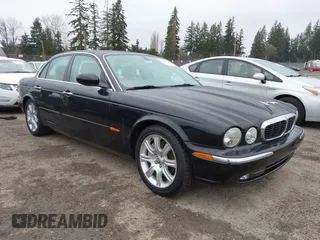 2004 Jaguar XJ with VIN SAJWA71C94SG29019, listed as a IAAI auction lot 41664978 with 133,546 mi miles. Bid and sale history available at carsss.com. Image 1.