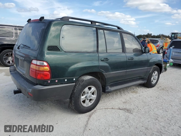 1999 Toyota Land Cruiser with VIN JT3HT05J9X0027448, listed as a Copart auction lot 77175814 with 0 mi miles and Salvage Title. Bid and sale history available at carsss.com. Image 3.