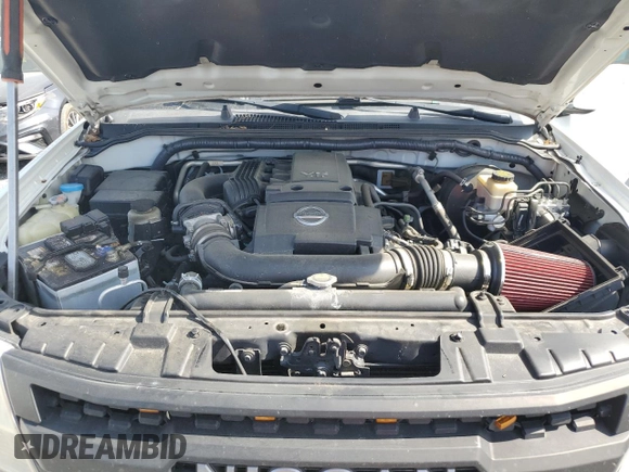 2015 Nissan Frontier Pro-4X with VIN 1N6AD0EV5FN700571, listed as a Copart auction lot 50974615 with 138,930 mi miles and Salvage title. Bid and sale history available at DreamBid. Image 12.