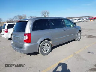 2013 Chrysler Town & Country Touring-L with VIN 2C4RC1CG6DR650928, listed as a IAAI auction lot 41740639 with 198,678 mi miles. Bid and sale history available at carsss.com. Image 4.