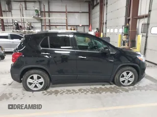 2020 Chevrolet Trax LT z VIN KL7CJLSB0LB092579, wystawiony jako IAAI lot #42038124 z przebiegiem 101 605 mil mil oraz . Historia ofert i sprzedaży dostępna na DreamBid. Obrazek 14.