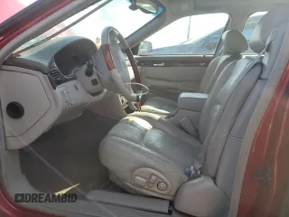 1999 Cadillac Seville Touring STS z VIN 1G6KY5496XU926352, wystawiony jako Copart lot #74711014 z przebiegiem 140 915 mil mil oraz Nie do naprawy • Non repairable. Historia ofert i sprzedaży dostępna na DreamBid. Obrazek 7.