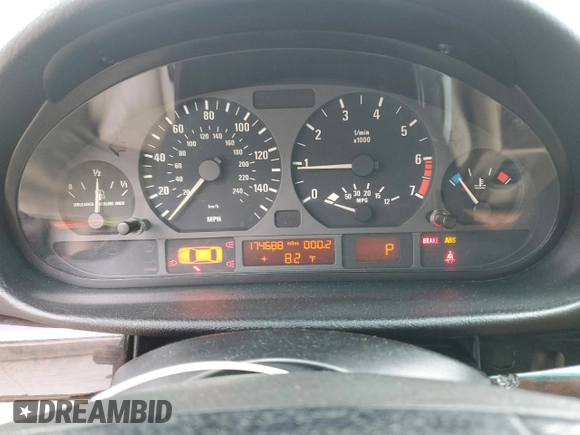 2000 BMW 3 Series 323i with VIN WBAAM3345YFP82665, listed as a Copart auction lot 59935495 with 174,688 mi miles and Salvage title. Bid and sale history available at DreamBid. Image 9.