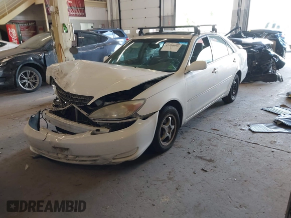 2004 Toyota Camry LE with VIN JTDBE32K540257588, listed as a IAAI auction lot 42208098 with 201,770 mi miles and . Bid and sale history available at DreamBid. Image 17.